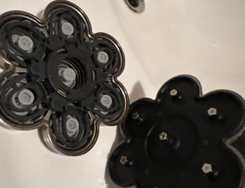 Disassembled Roundry components on a sink