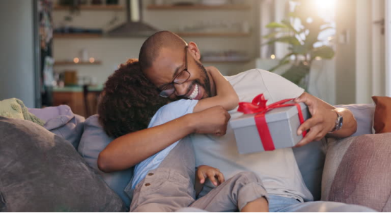 Hugging pair with gift box (Roundry) in Roundry Gift Guide